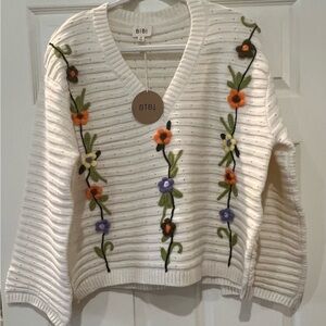 BiBi White V-Neck Sweater with Floral Embroidery
